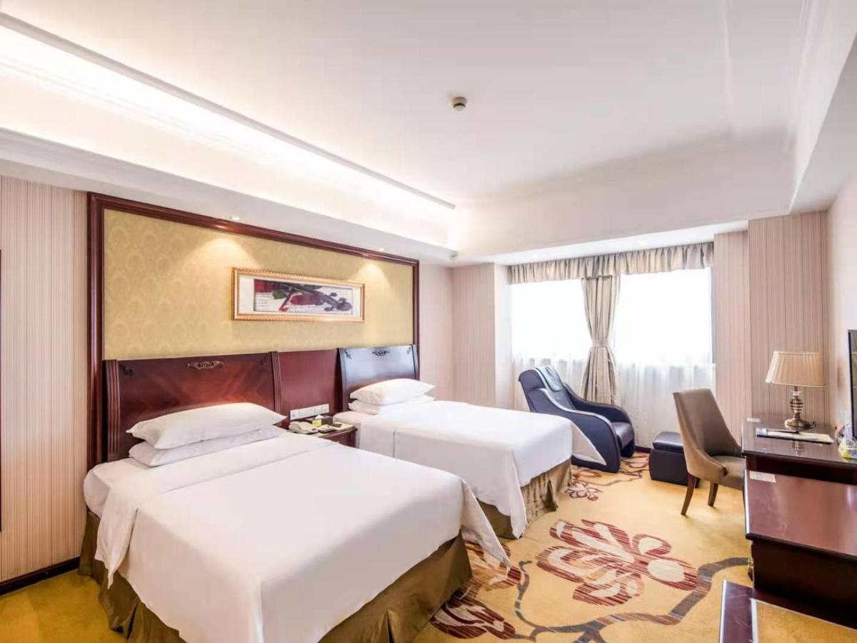 Vienna International Hotel Shanghai Pudong Xiupu Road Buitenkant foto